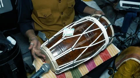 Indian Man Playing Dholak Drum at Wedding Celebration Stock Footage 329384558