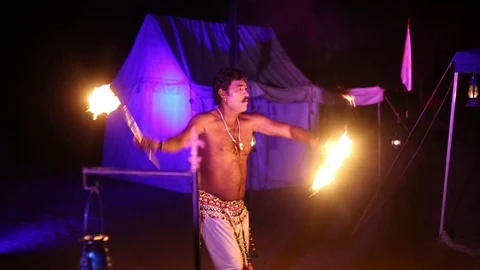 Indian man playing with fire and dancing, folk dancer, Video stock 92846191