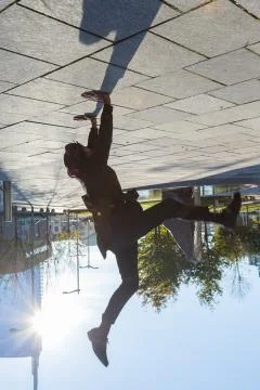 Indian man posing in an urban context. Stock Photos