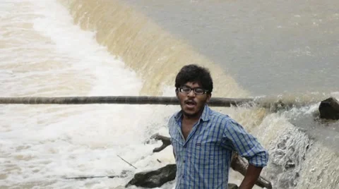 Indian man standing close to river Video stock 59824287