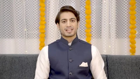 Indian man talking to camera Stock Footage 249398982