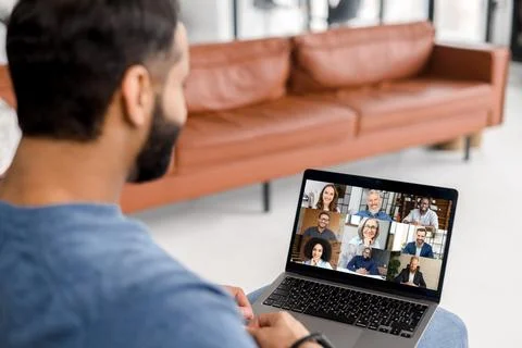 Indian man using computer app for communicating Foto stock