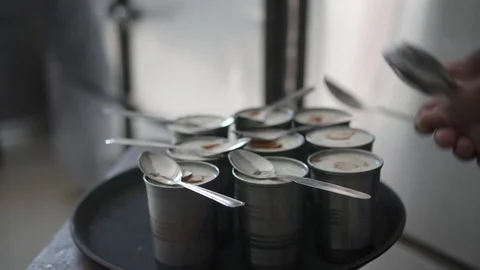 Indian man worker working in local cafe preparing dinner standing in kitchen Stock Footage 119890224