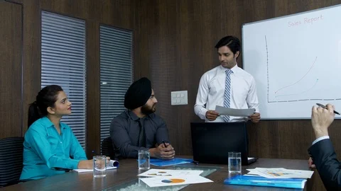 Indian manager presenting his monthly sales report to his senior colleagues -... 動画素材 111362027