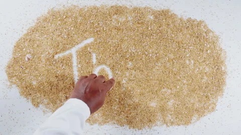 An Indian man's Hand Writes On Beach Sand words Three Stock Footage 248660699