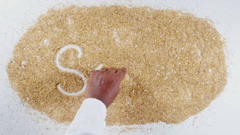 An Indian man's Hand Writes On Beach Sand words Sand 2022 Stock Footage 248663841