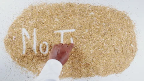 An Indian man's Hand Writes On Beach Sand words No thanks Stock Footage 248664695