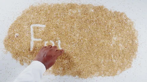 An Indian man's Hand Writes On Beach Sand words Fourteen Stock Footage 248666340