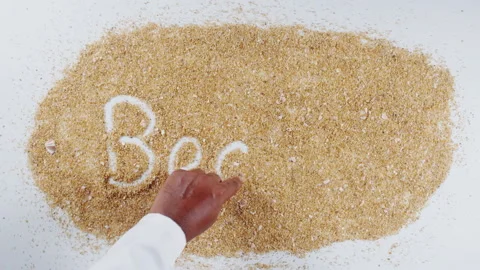 An Indian man's Hand Writes On Beach Sand words Beach Stock Footage 248670019