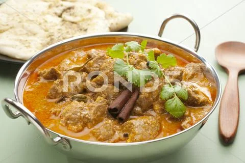 Indian meal food curry lamb rogan josh naan bread Stock Photos