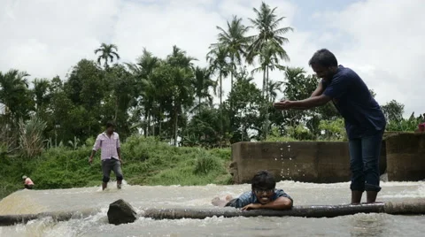 Indian men by the dam Stock Footage 59822962