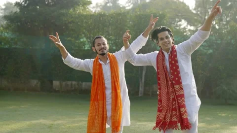 Indian men doing Bhangra dance Stock Footage 230168772