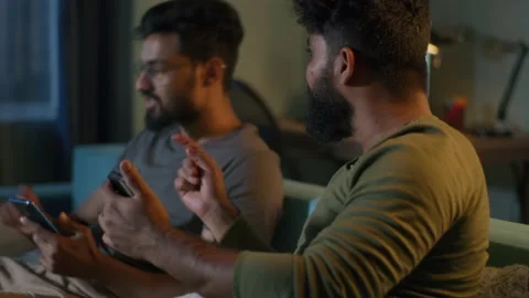 Indian men making online bets during match Video stock 162018575