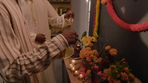 Indian Men Performing Traditional Prayer Ritual at Home Altar Stock Footage 344964159