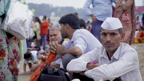 Indian men sitting at the beach, Mumbai, IndiaStock Footage