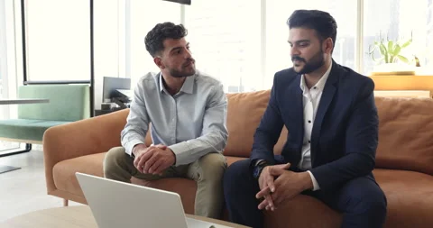 Indian mentor provide help with program to new employee Stock Footage 249093504