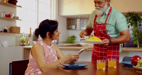 Indian mid age couple at home Stock-Footage 343370144
