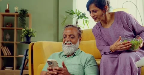 Indian mid age couple at home Video stock 343370836