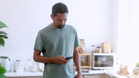 Indian middle-aged man, freelancer, business people talking to mobile phone.. Stock Footage 254657893