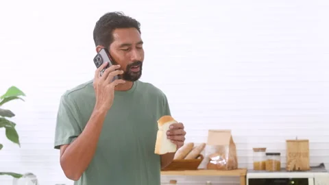 Indian middle-aged man, freelancer, male with mustache and beard drinking h.. Stock Footage 254696470
