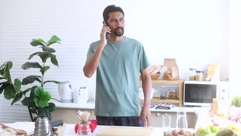 Indian middle-aged man, freelancer, business people talking to mobile phone.. Stock Footage 254697053