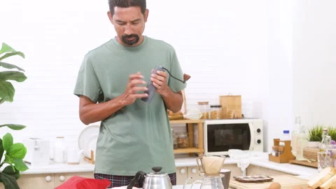 Indian middle-aged man, freelancer, healthy male with mustache making DIY d.. Stock Footage 254705375