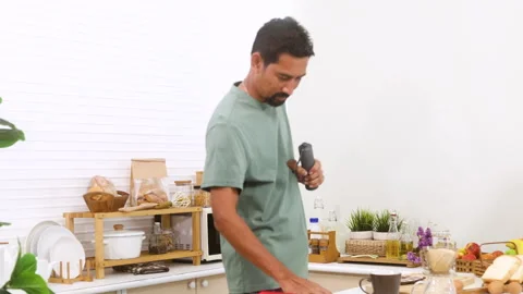 Indian middle-aged man, freelancer, healthy male with mustache making DIY d.. Stock Footage 254705597