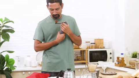 Indian middle-aged man, freelancer, healthy male with mustache making DIY d.. Stock Footage 254749299