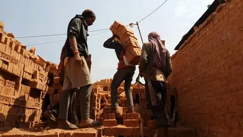 Indian migrant workers in Brick Factory. Stock Footage 78696372