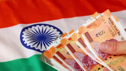 Indian money. Counting a stack of 200 and 500 rupee banknotes Stock Footage 345413716