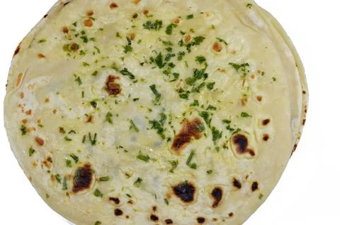 Indian naan bread baked inside a very hot clay tandoor oven, delicious, sof.. Stock-Fotos