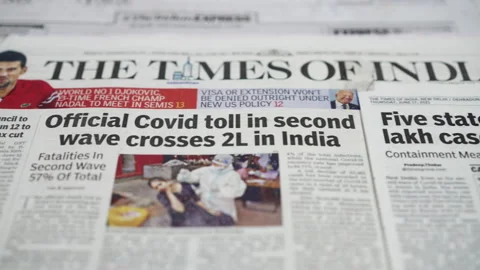 Indian Newspaper second wave 2 lac new cases Coronavirus impacts in India. Stock Footage 172523227