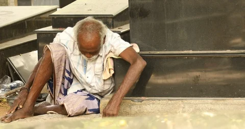 Indian Old man at Graveyard Stock Footage 93568359