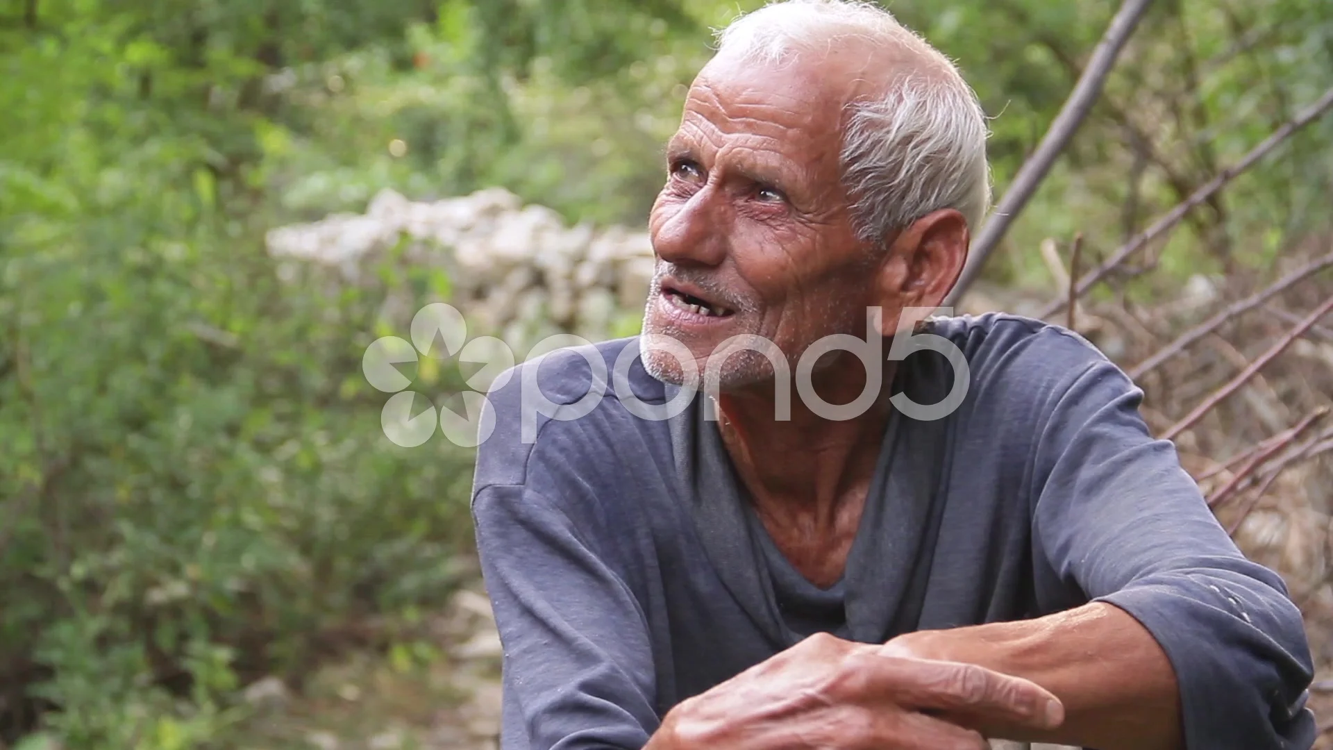 Indian old man talking