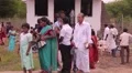 Indian people and European missioners at a church in India HD Footage
