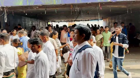 Indian People create a bustling scene at a popular Street market. Stock Footage 258656405