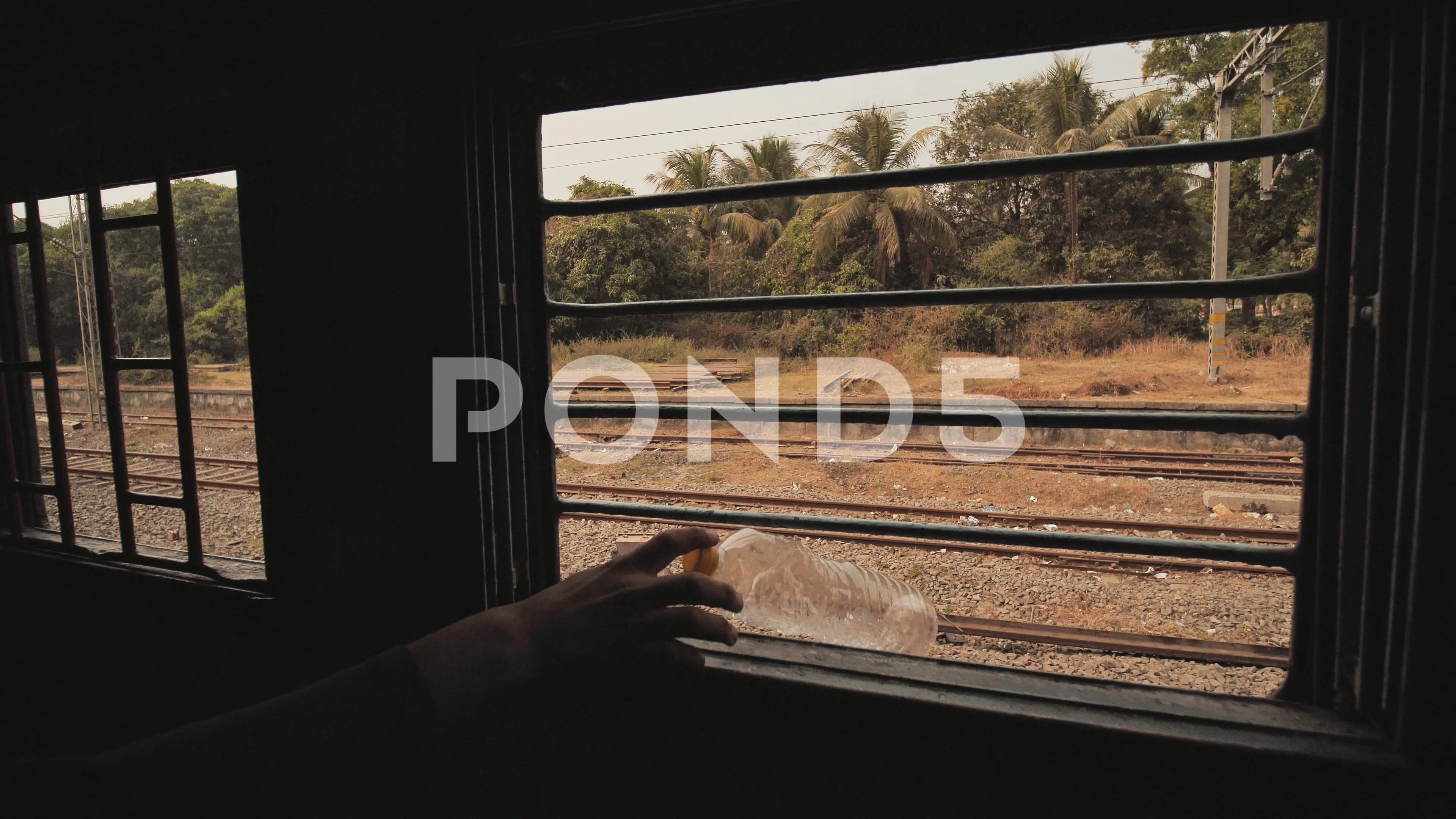 water bottle at a train window Stock Photo - Alamy