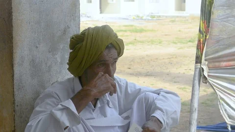 Indian person sitting Stock Footage 102758960
