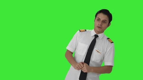Indian pilot doing inspection before flight Green screen Stock Footage 253161298