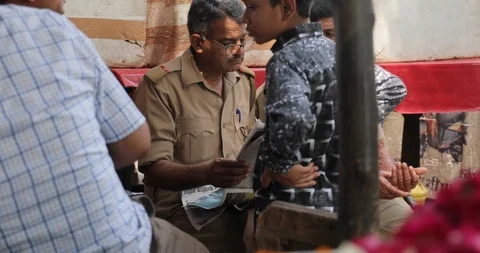 Indian Policeman reading newspaper Video stock 111760657