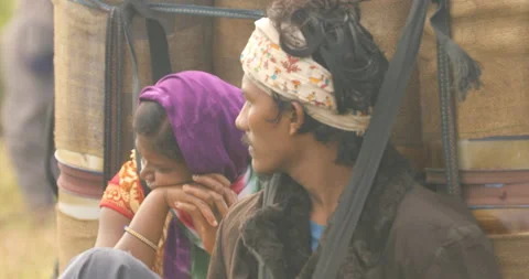 Indian Poor Couple workers with Cans on Hill Stock Footage 326793917