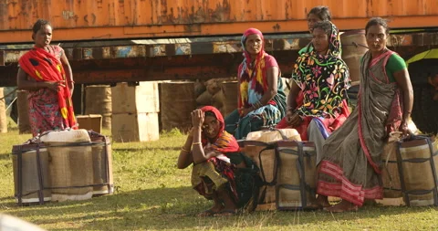 Indian Poor women workers with Cans on Hill Stock Footage 327043530
