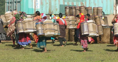 Indian Poor workers with Cans on Hill Stock Footage 326777065