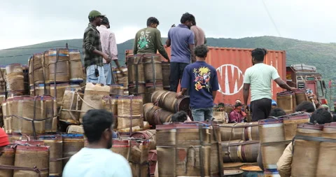 Indian Poor workers with Cans on Hill Stock Footage 326859256