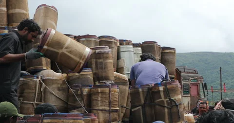 Indian Poor workers with Cans on Hill Stock Footage 326860359