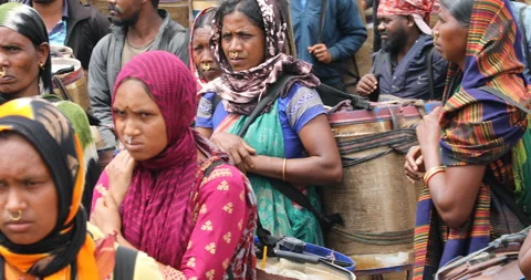 Indian Poor workers with Cans on Hill Stockbeeldmateriaal 326861025