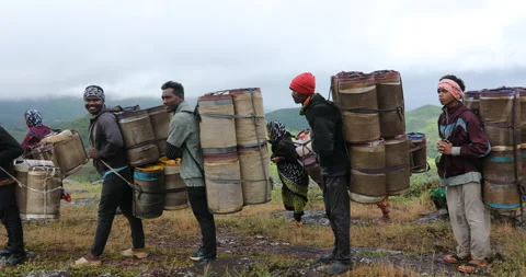 Indian Poor workers with Cans on Hill Stock-Footage 326929132