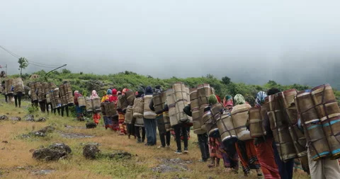 Indian Poor workers with Cans on Hill Stock Footage 326938436