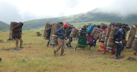 Indian Poor workers with Cans on Hill Stock Footage 326943073