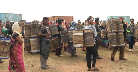 Indian Poor workers with Cans on Hill Video stock 327107855